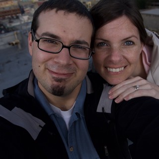 Rooftop Couple Selfie with City Views Below