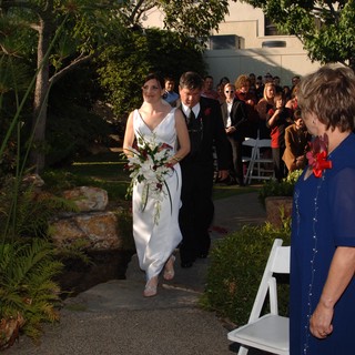 Bride Walks Down Outdoor Garden Wedding Aisle