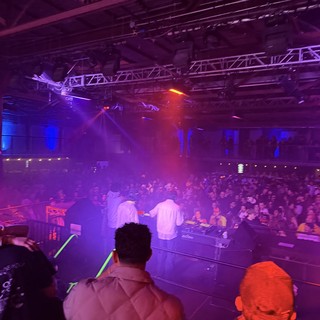 Electronic Music Concert with DJ Performance and Crowd