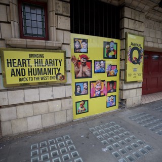 Avenue Q Theatre Posters on West End Building