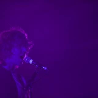 Purple Spotlight Singer