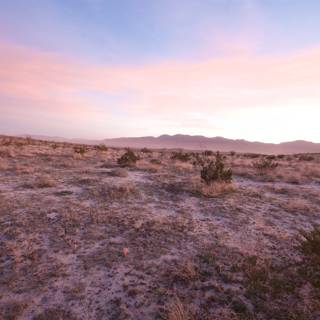 Pink Sky Over Desert Mountains