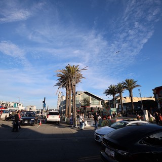Bustling Coastal Shopping District at Golden Hour