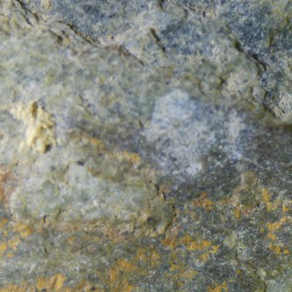 Macro Close-Up of Mineral-Rich Rock Surface
