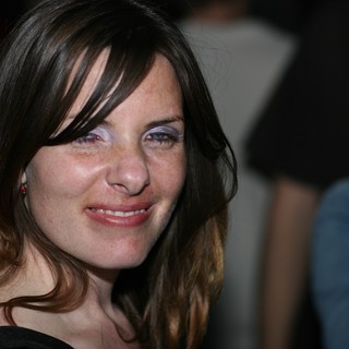 Woman Smiling at Valentine's Day Party 2006