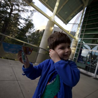Young Boy Enjoying Ice Cream at Science Center