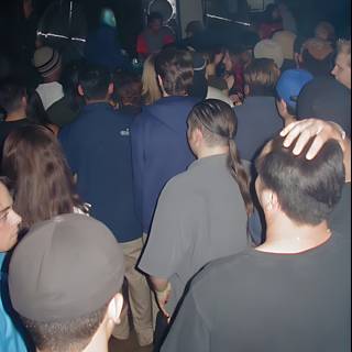 Nightclub Party with DJ and a Crowded Room