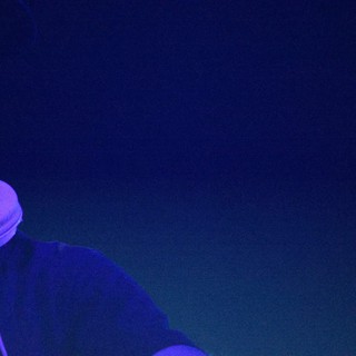 DJ Bathed in Blue Light at Wobbleland 2026