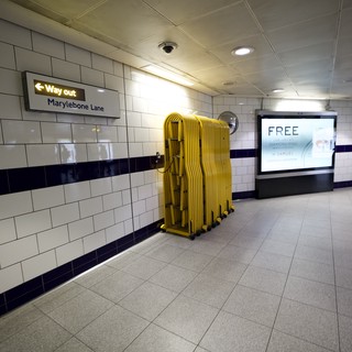 Yellow Safety Barriers at Marylebone Lane Underground Station Exit