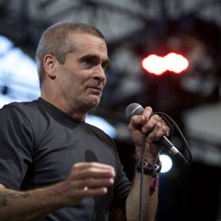 Henry Rollins Takes the Stage with Tattoos and a Mic