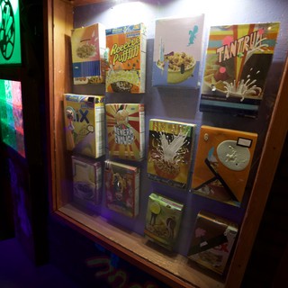 Vintage Cereal Box Display in Nostalgic Museum Setting