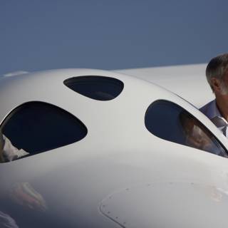 Burt Rutan and Richard Branson next to their plane