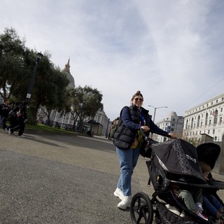 Parent with Stroller Exploring San Francisco Civic Center