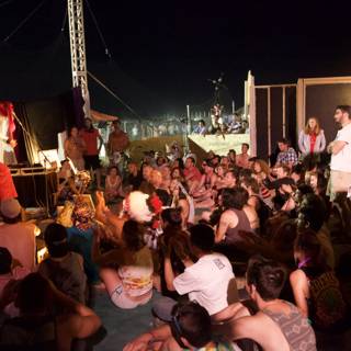 Coachella Nightlife: Crowded Stage under the Night Sky