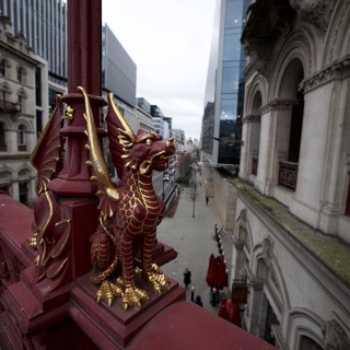 Guardian Dragon Overlooking Historic London Street