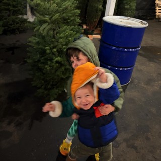 Brothers Embrace at Christmas Tree Farm