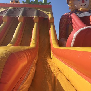 Giant Autumn Harvest Inflatable Slide at Festival