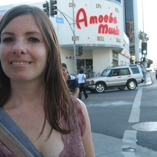 Woman Smiling Outside Amoeba Music on Sunset