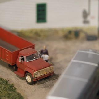 Weathered Red Grain Truck at Model Farm Scene