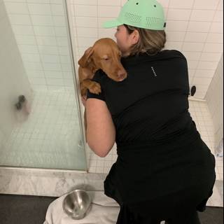 A Woman and her Canine Companion Take a Shower