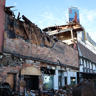 Aftermath of Building Destruction and Demolition Site