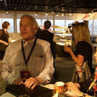 Buzz Aldrin's Business Lunch at a Modern Cafe