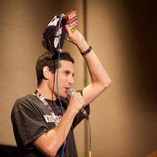 Microphone in Hand, Hat on Head