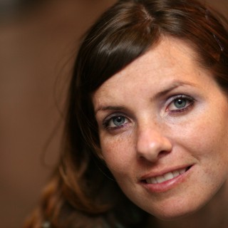 Warm Smile of a Blue-Eyed Woman Named Penelope