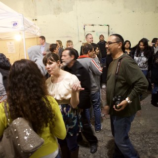 Crowded Indoor Wine Party Gathering at Night