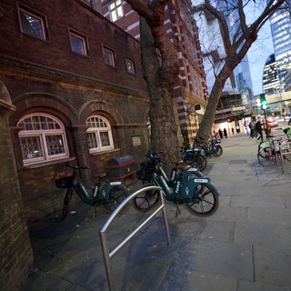 Urban Twilight: Bike Share Station in Historic London