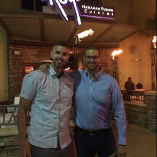 Two Men Enjoy a Night Out at the Local Restaurant