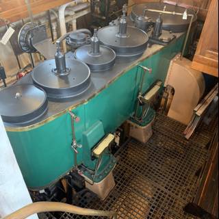 The Mighty Green Cookware Factory Machine