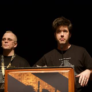 Two Men Addressing the Crowd at Defcon