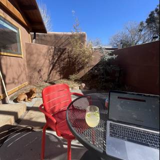 Outdoor Workstation with Laptop on a Patio Table