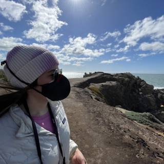 Woman in a Face Mask Takes on a Rocky Trail