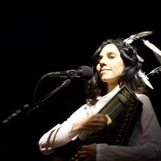 PJ Harvey Performs with a Guitar and Headdress at Coachella 2011