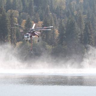 Helicopter and Fire Truck Over Lake