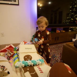 Toddler's First Christmas Morning with Gingerbread Person Cake