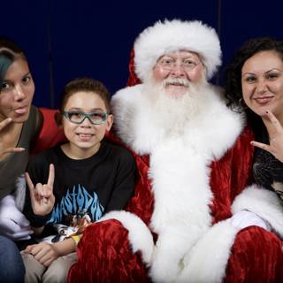 Santa Claus Brings Joy to a Family Christmas Party