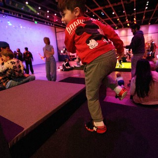 Young Child Dancing at Baby Rave Event