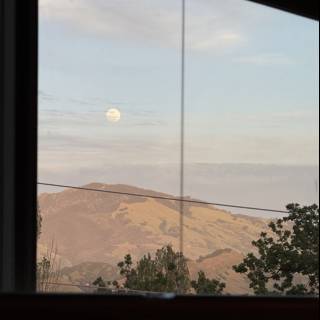 Moonlit Hills at Dusk