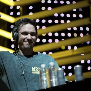 DJ AM Performing with Headphones On