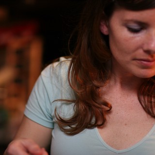 Penelope Lost in Thought in Warm Light
