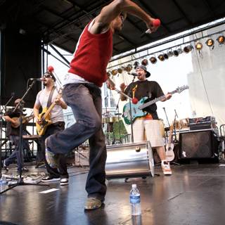 Red-Shirted Performer Rocks the Stage