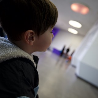Child Engaged in Learning Activity Indoors
