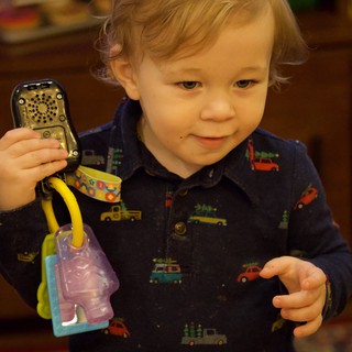 Toddler Playing with Toy Phone on Christmas