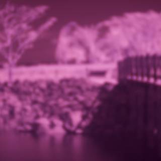 Infrared Glow on River Bridge