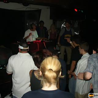 Nightclub Fun with DJ and Crowd