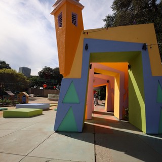 Colorful Whimsical Gateway with Bell Tower at Fantasyland