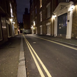 Quiet London Street Illuminated at Night